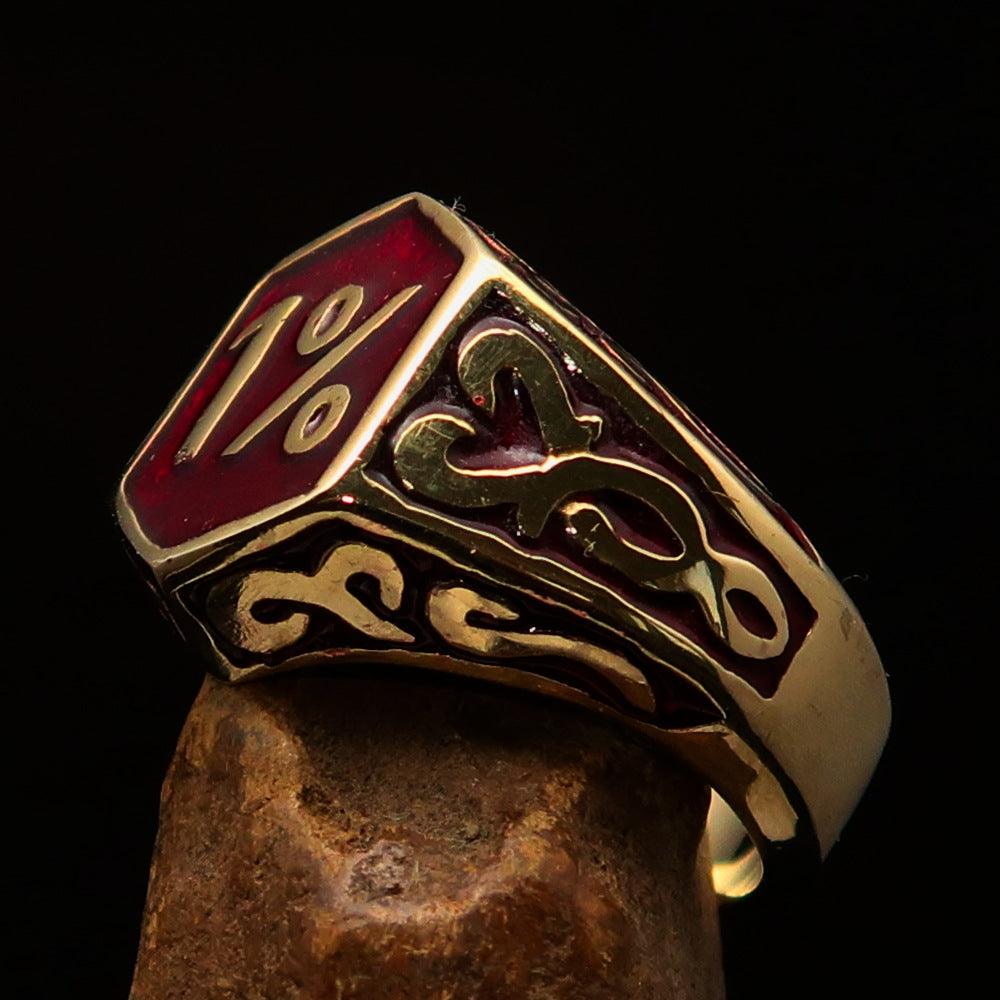 Men's Red Outlaw Biker Ring 1% made of solid brass with high polish and red enamel finish, showcasing its unique design and craftsmanship.