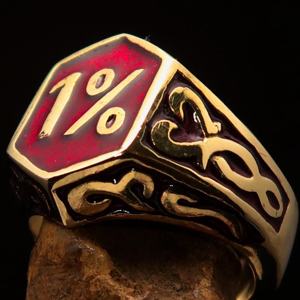 Men's Red Outlaw Biker Ring 1% made of solid brass with high polish and red enamel finish, showcasing its unique design and craftsmanship.