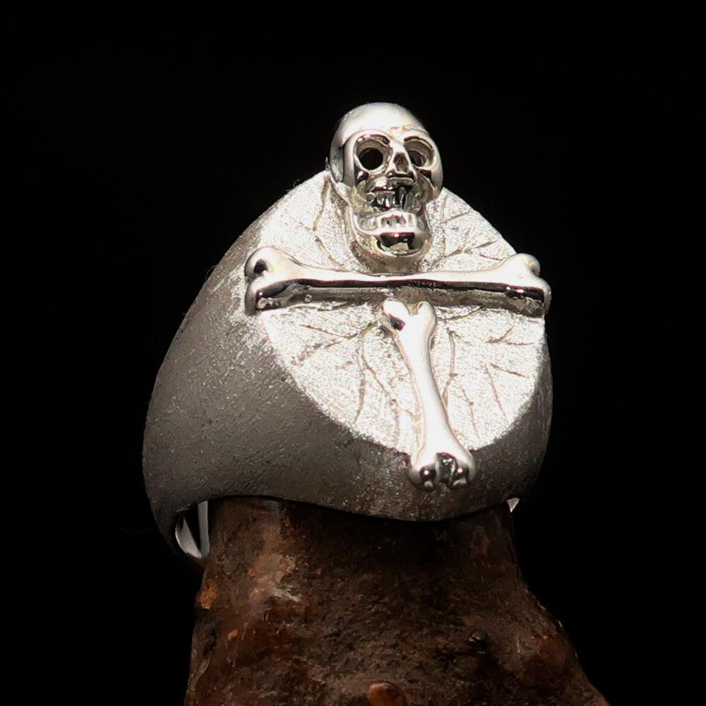 Men's sterling silver ring featuring a Bone Cross and R.I.P Skull design with a matte finish and polished accents.