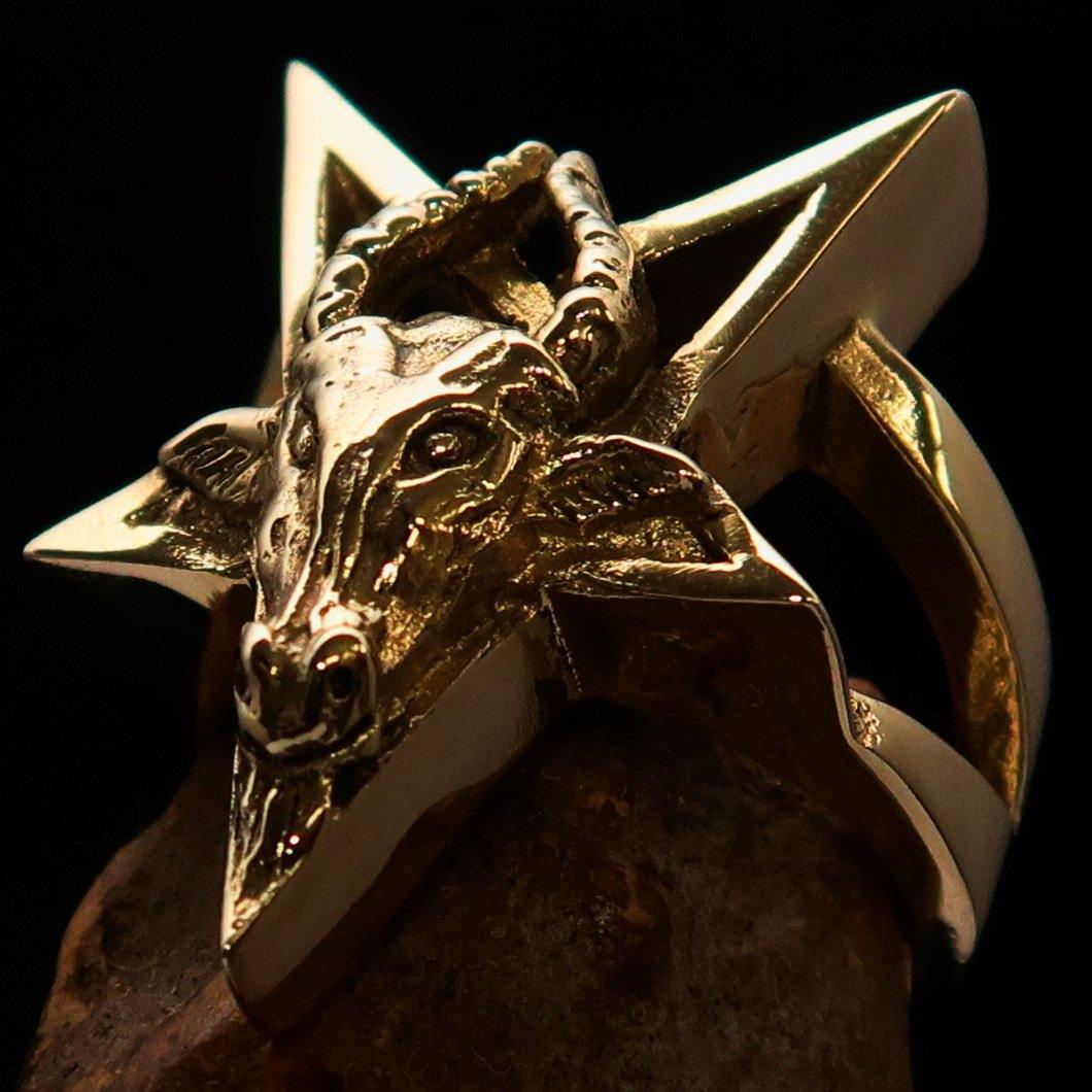 Men's ring featuring a detailed goat head pentagram design, crafted from solid brass with an antiqued and polished finish.