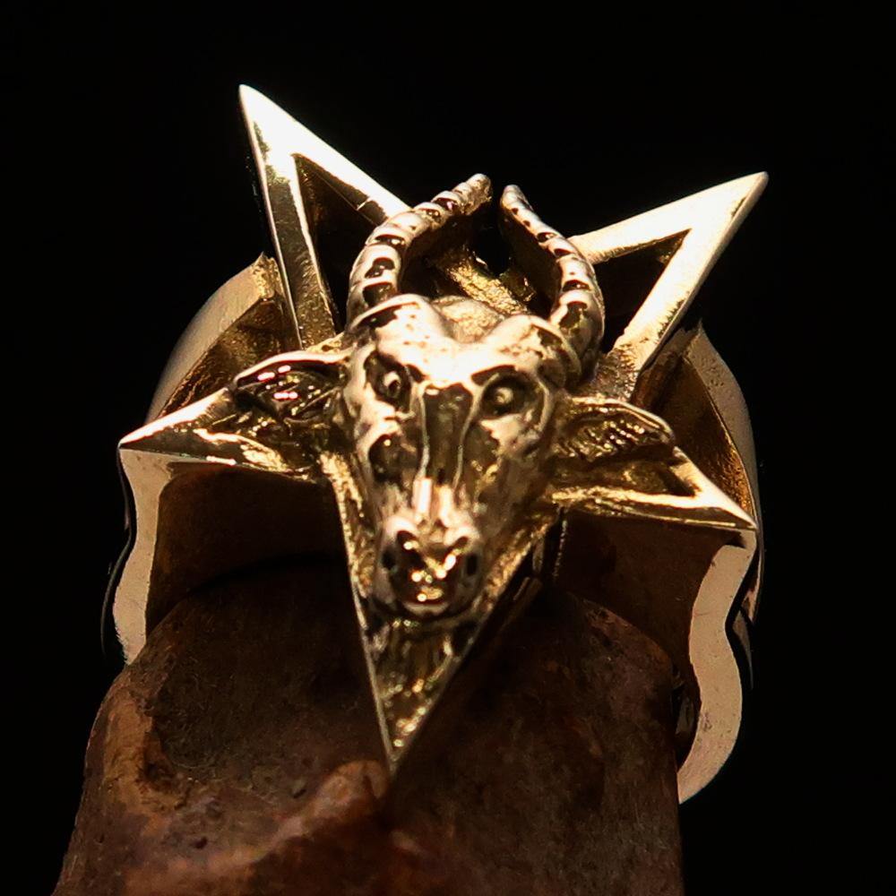 Men's ring featuring a detailed goat head pentagram design, crafted from solid brass with an antiqued and polished finish.