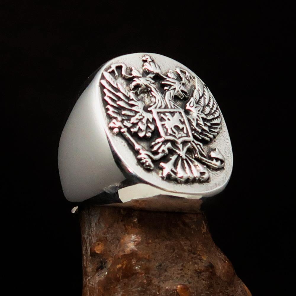 Men's Russian Eagle Seal Ring made of sterling silver with intricate eagle design and polished finish.