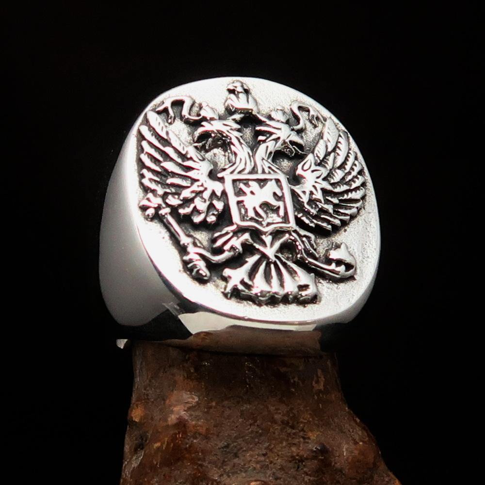 Men's Russian Eagle Seal Ring made of sterling silver with intricate eagle design and polished finish.