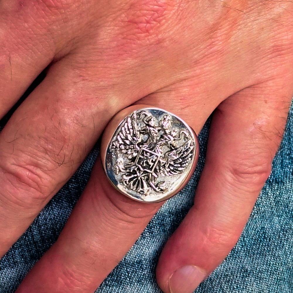 Men's Russian Eagle Seal Ring made of sterling silver with intricate eagle design and polished finish.