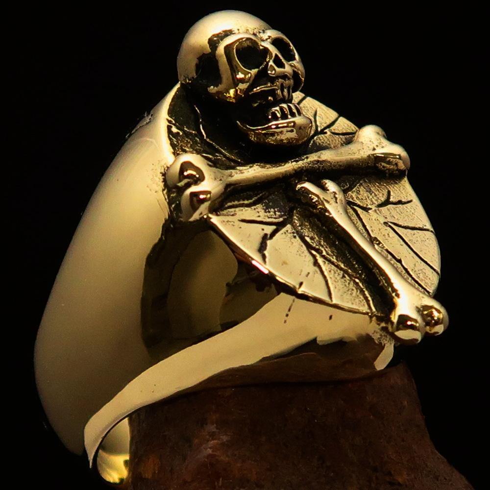 Men's Skull Ring made of solid brass featuring an R.I.P design, showcasing intricate details and a polished finish.