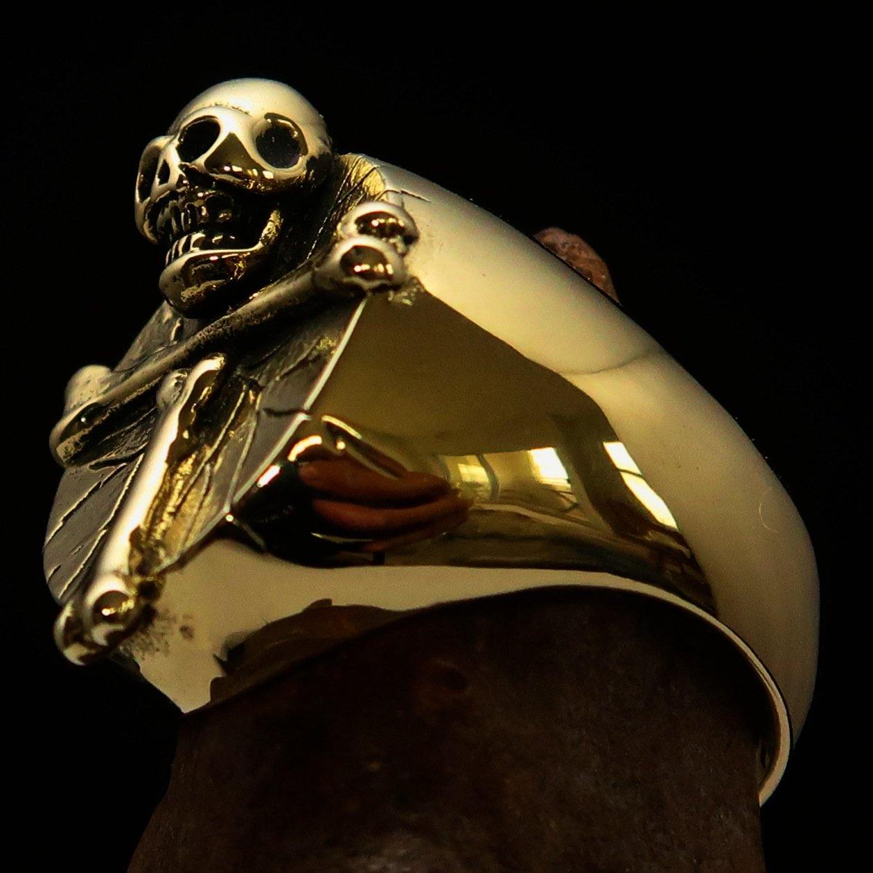 Men's Skull Ring made of solid brass featuring an R.I.P design, showcasing intricate details and a polished finish.