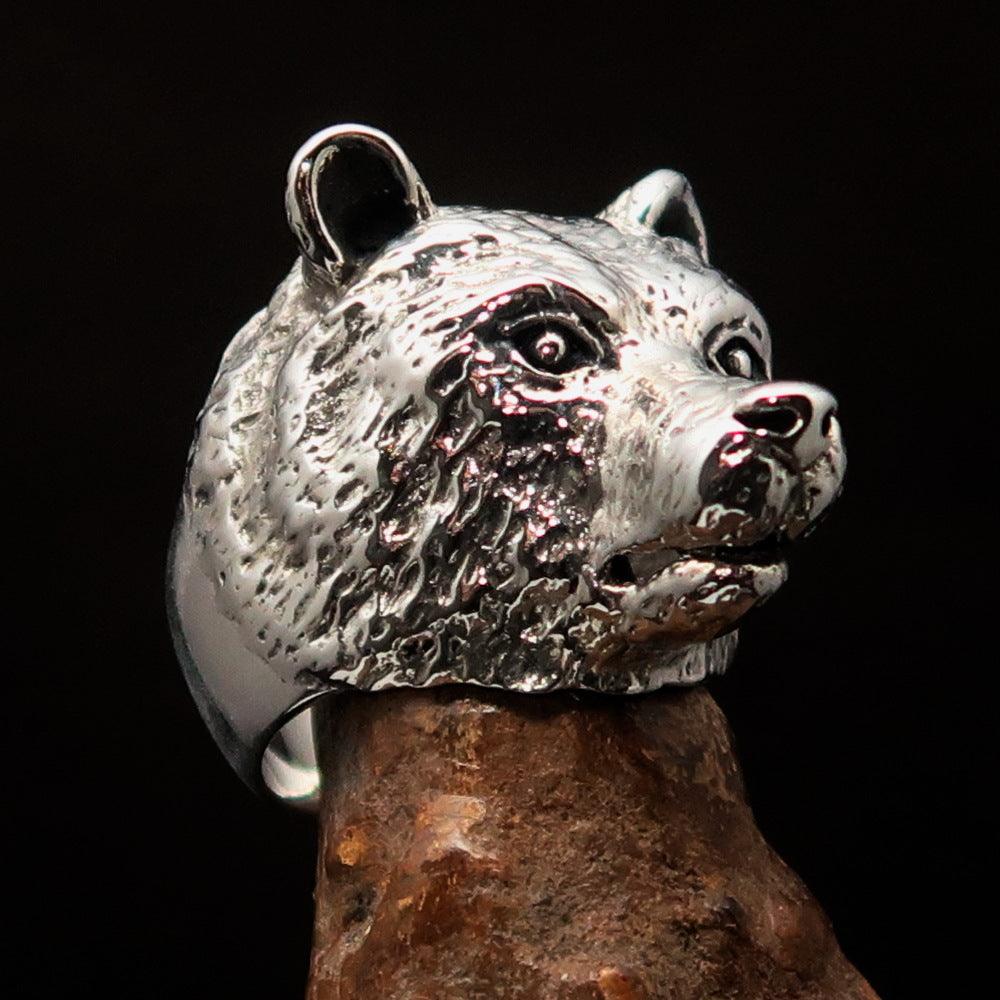 Men's sterling silver ring featuring an antiqued grizzly bear design, showcasing quality craftsmanship and unique style.