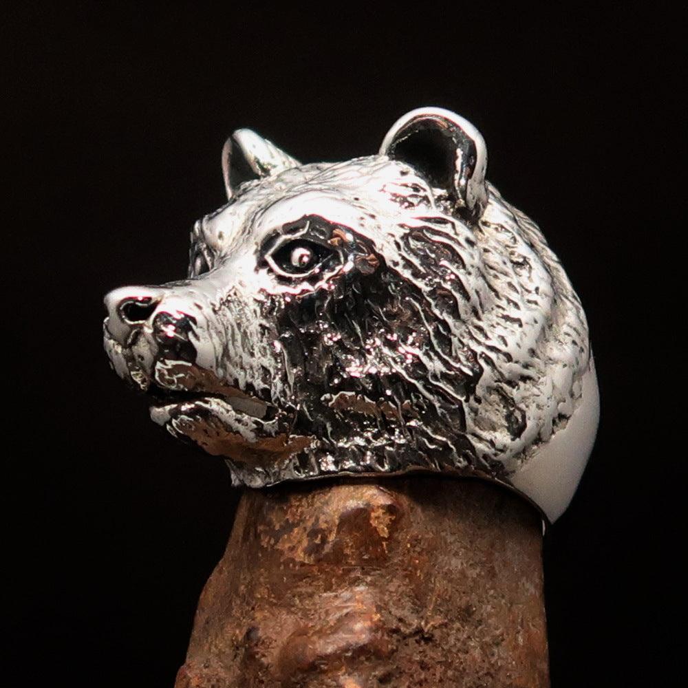 Men's sterling silver ring featuring an antiqued grizzly bear design, showcasing quality craftsmanship and unique style.