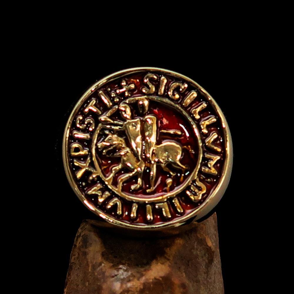 Men's Templar Knight Seal Ring made of solid brass with a high-polished finish and vibrant orange enamel, showcasing intricate design.