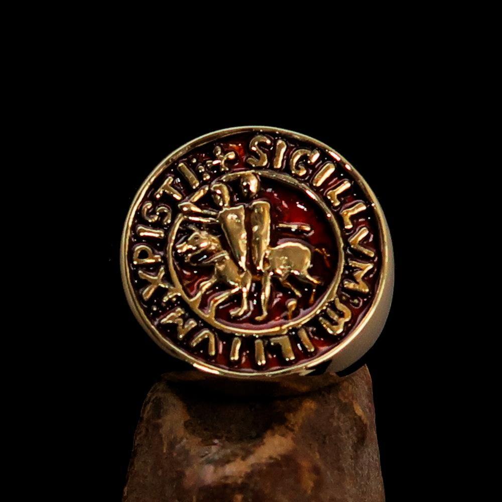 Men's Templar Knight Seal Ring made of solid brass with a high-polished finish and vibrant orange enamel, showcasing intricate design.