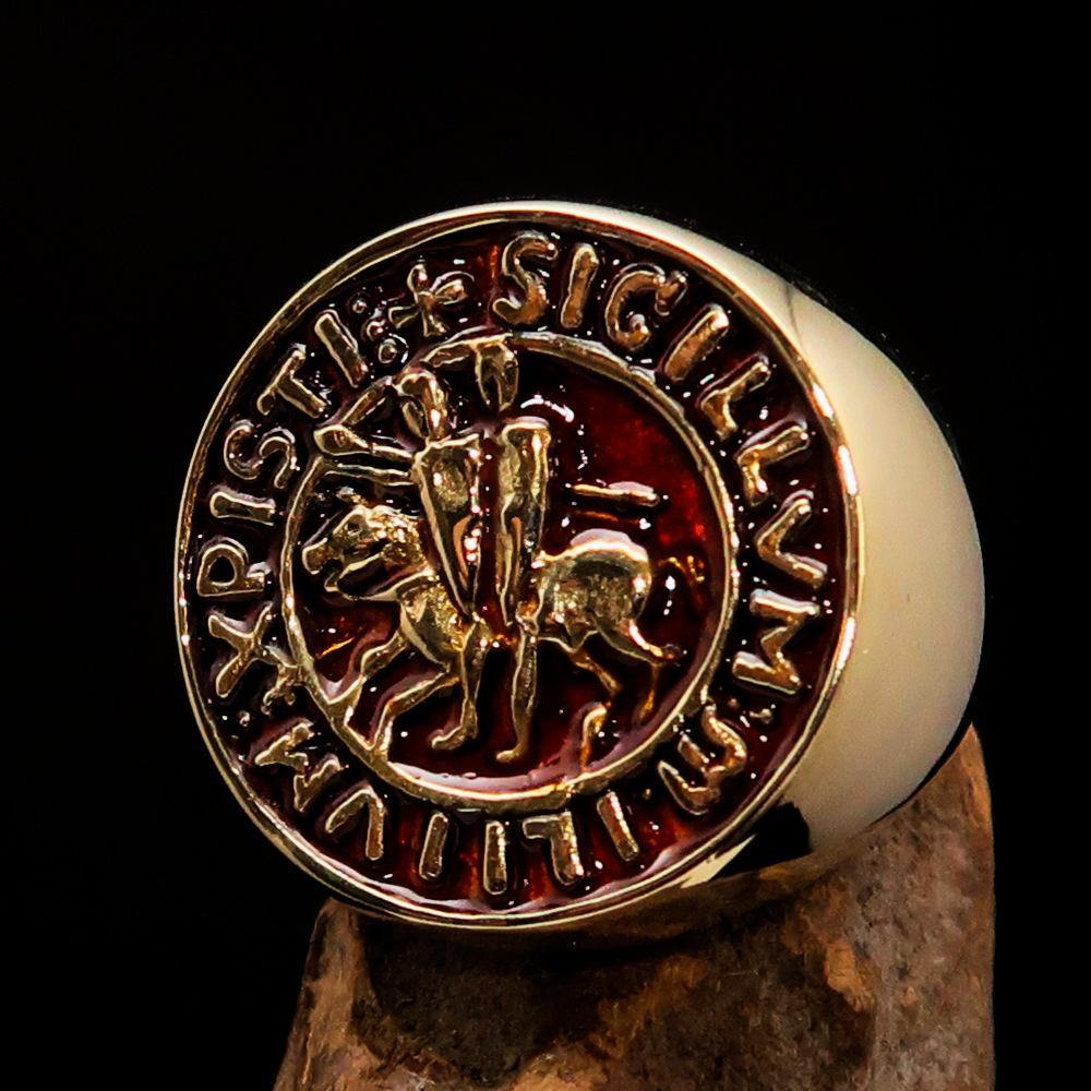 Men's Templar Knight Seal Ring made of solid brass with a high-polished finish and vibrant orange enamel, showcasing intricate design.