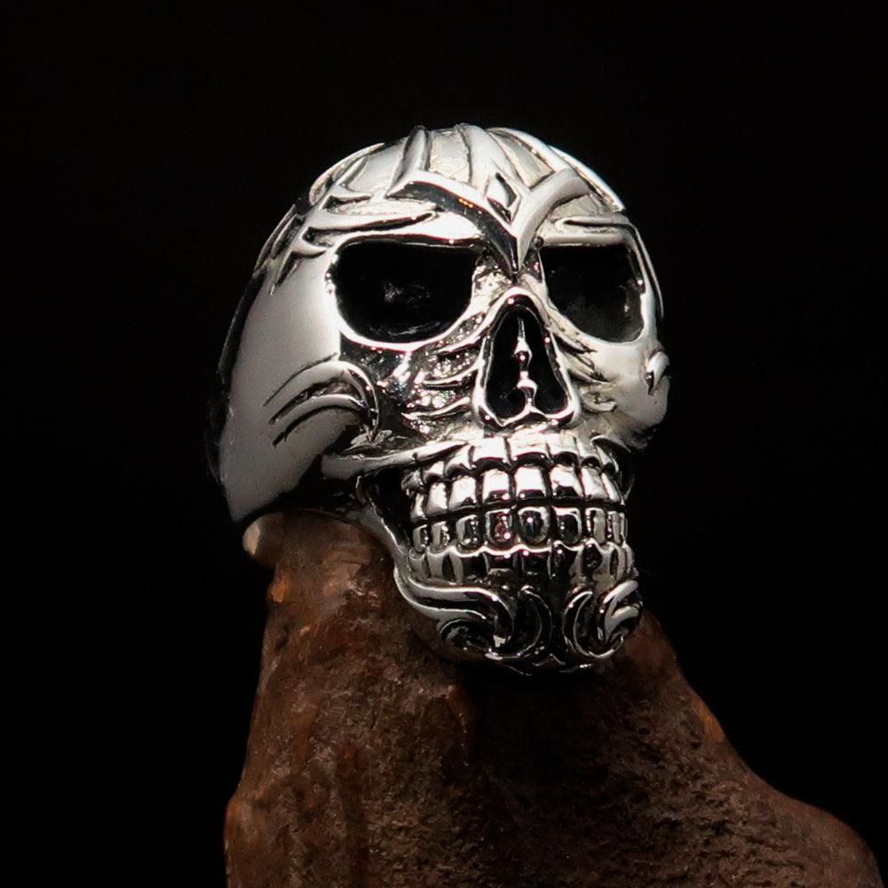 Men's Tribal Skull Ring made of solid sterling silver with a high polished and antiqued finish, featuring intricate tribal designs.