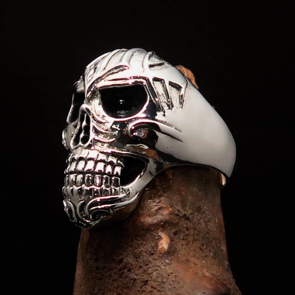 Men's Tribal Skull Ring made of solid sterling silver with a high polished and antiqued finish, featuring intricate tribal designs.