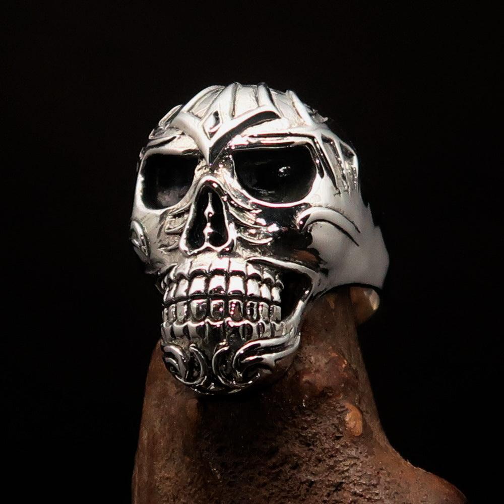 Men's Tribal Skull Ring made of solid sterling silver with a high polished and antiqued finish, featuring intricate tribal designs.