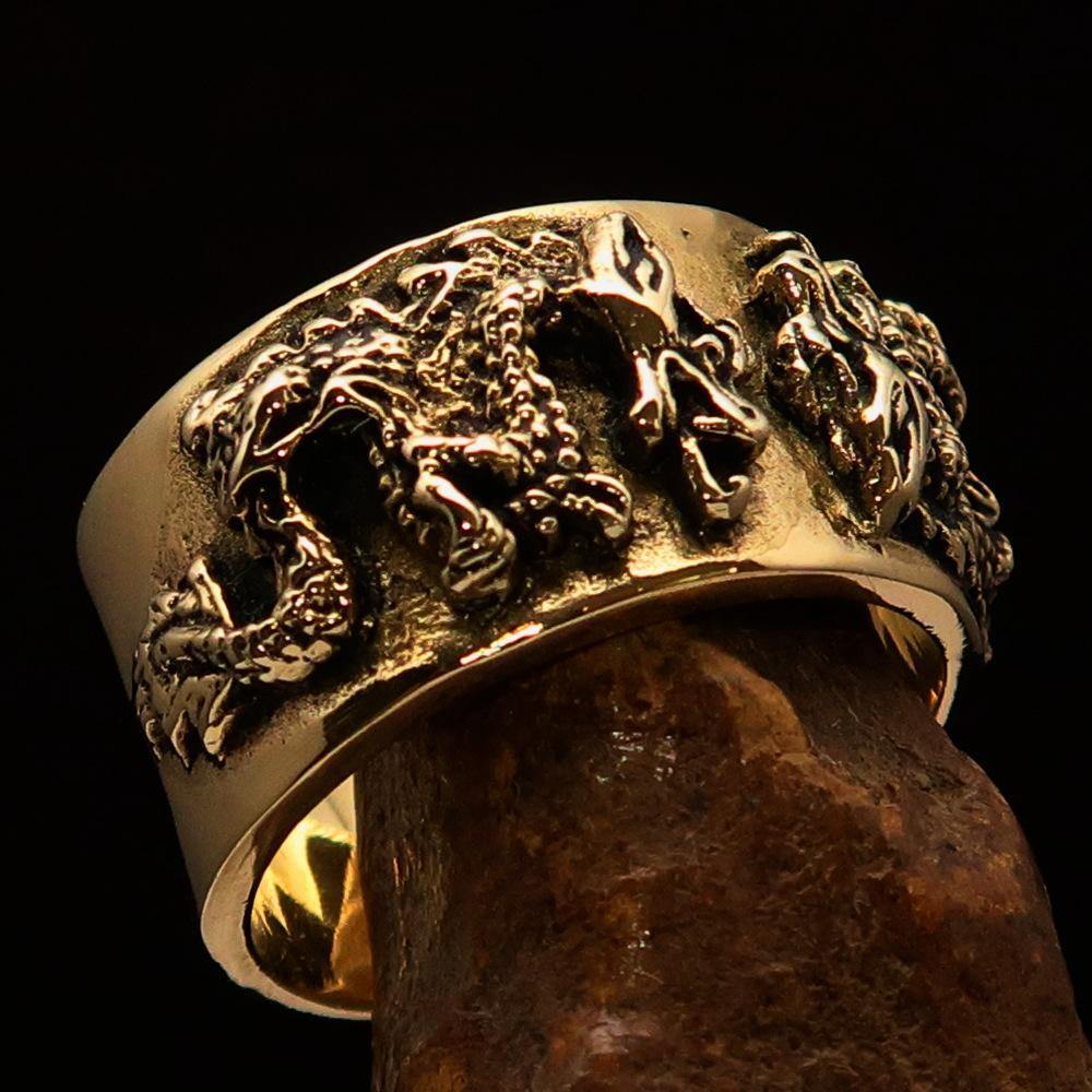 Men's Two Dragon Ring made of solid brass, featuring intricate dragon designs with antiqued and polished finishes.