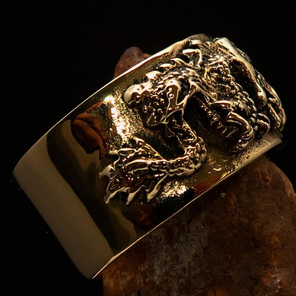 Men's Two Dragon Ring made of solid brass, featuring intricate dragon designs with antiqued and polished finishes.