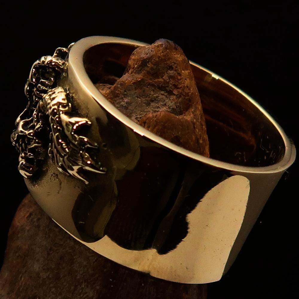 Men's Two Dragon Ring made of solid brass, featuring intricate dragon designs with antiqued and polished finishes.