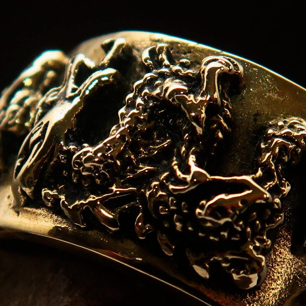 Men's Two Dragon Ring made of solid brass, featuring intricate dragon designs with antiqued and polished finishes.