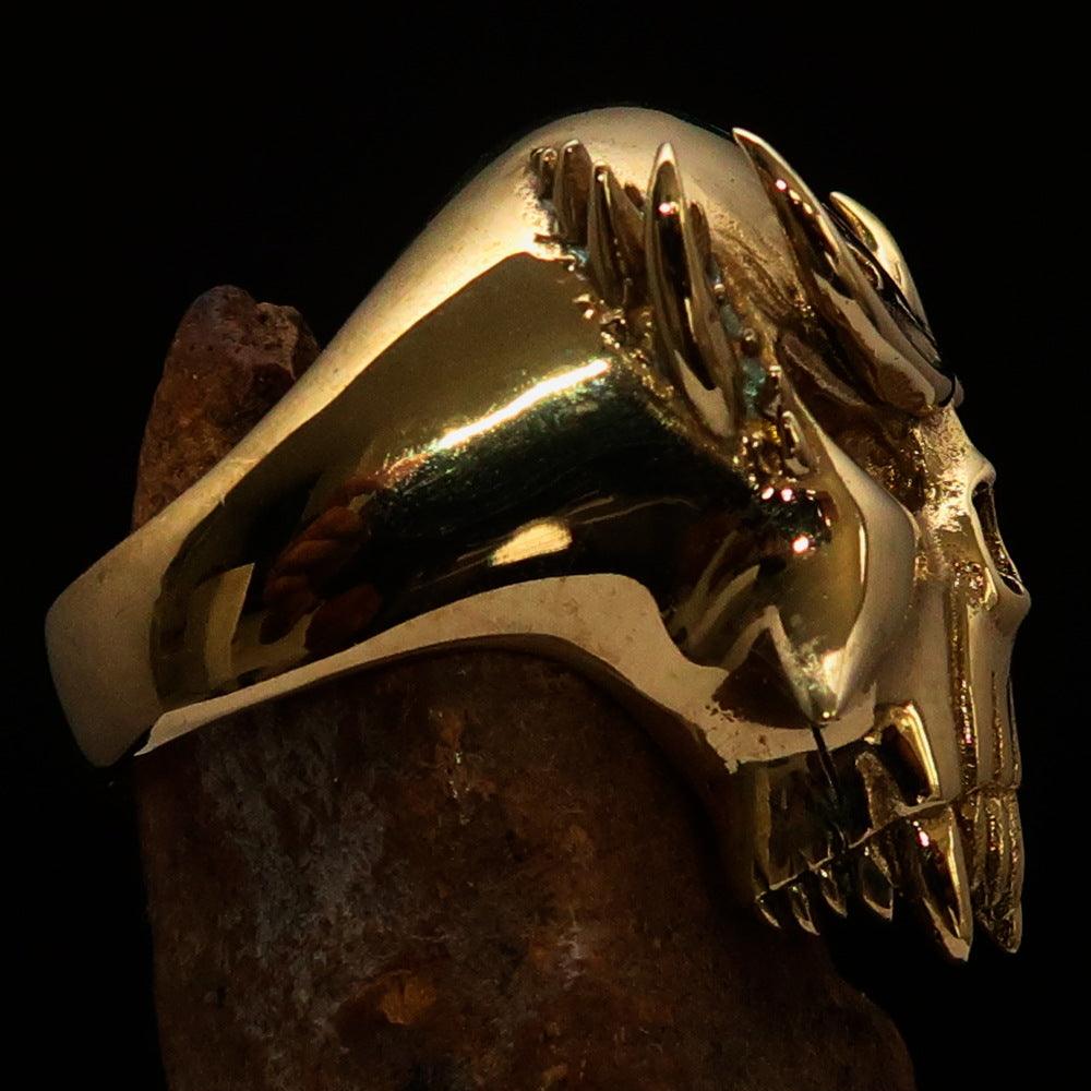 Men's Vampire Skull Ring featuring a green diamond accent, crafted from solid brass with a high polished finish and green enamel.