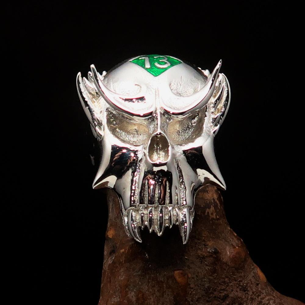 Men's Vampire Skull Ring crafted from sterling silver with a green diamond, featuring intricate detailing and a high polished finish.