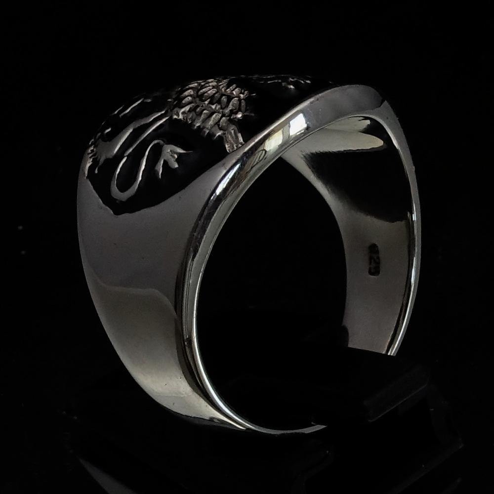 Men's Winged Lion Griffin Ring in black enamel and sterling silver, showcasing intricate design and high polish finish.