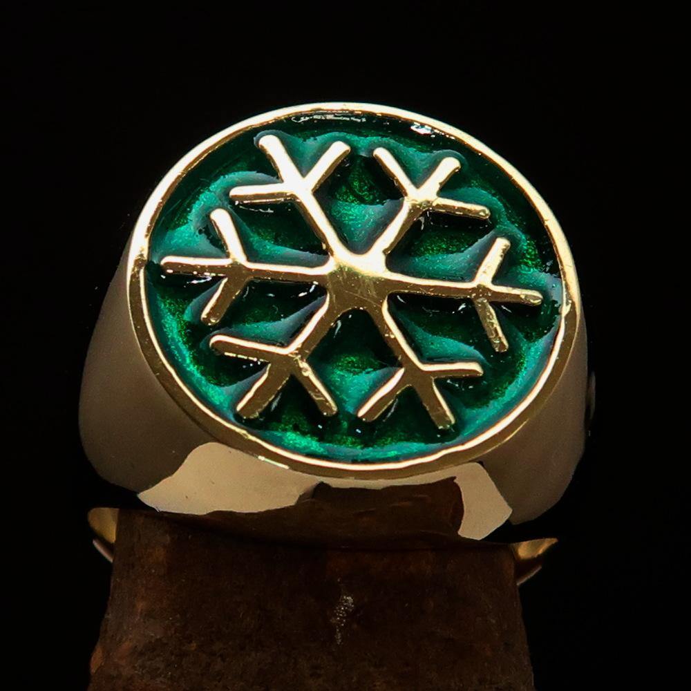 Men's Winter Ring made of solid brass featuring a green snowflake design, polished to a high shine.