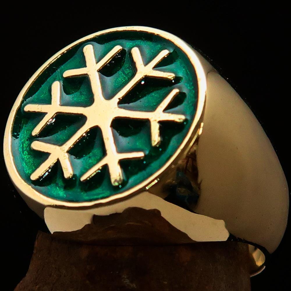 Men's Winter Ring made of solid brass featuring a green snowflake design, polished to a high shine.