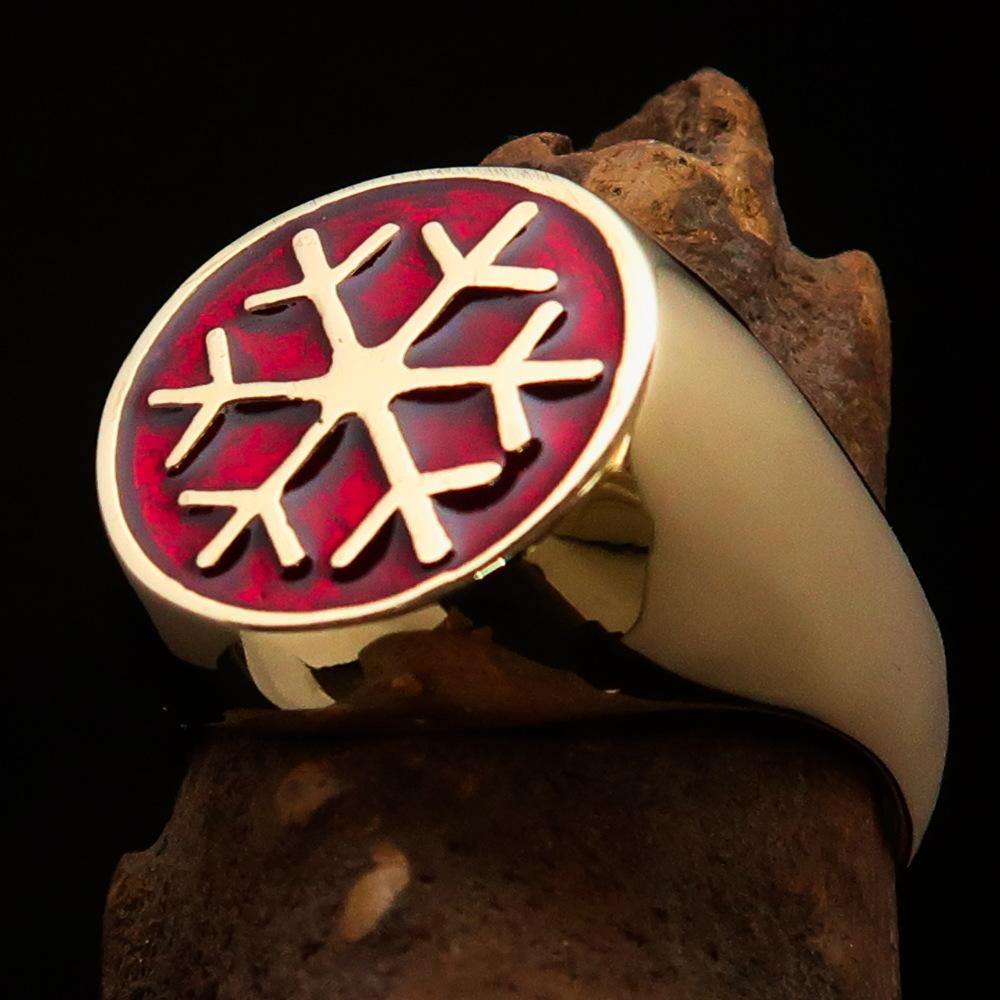 Men's Winter Ring made of solid brass featuring a high polished finish and a vibrant red snowflake design.