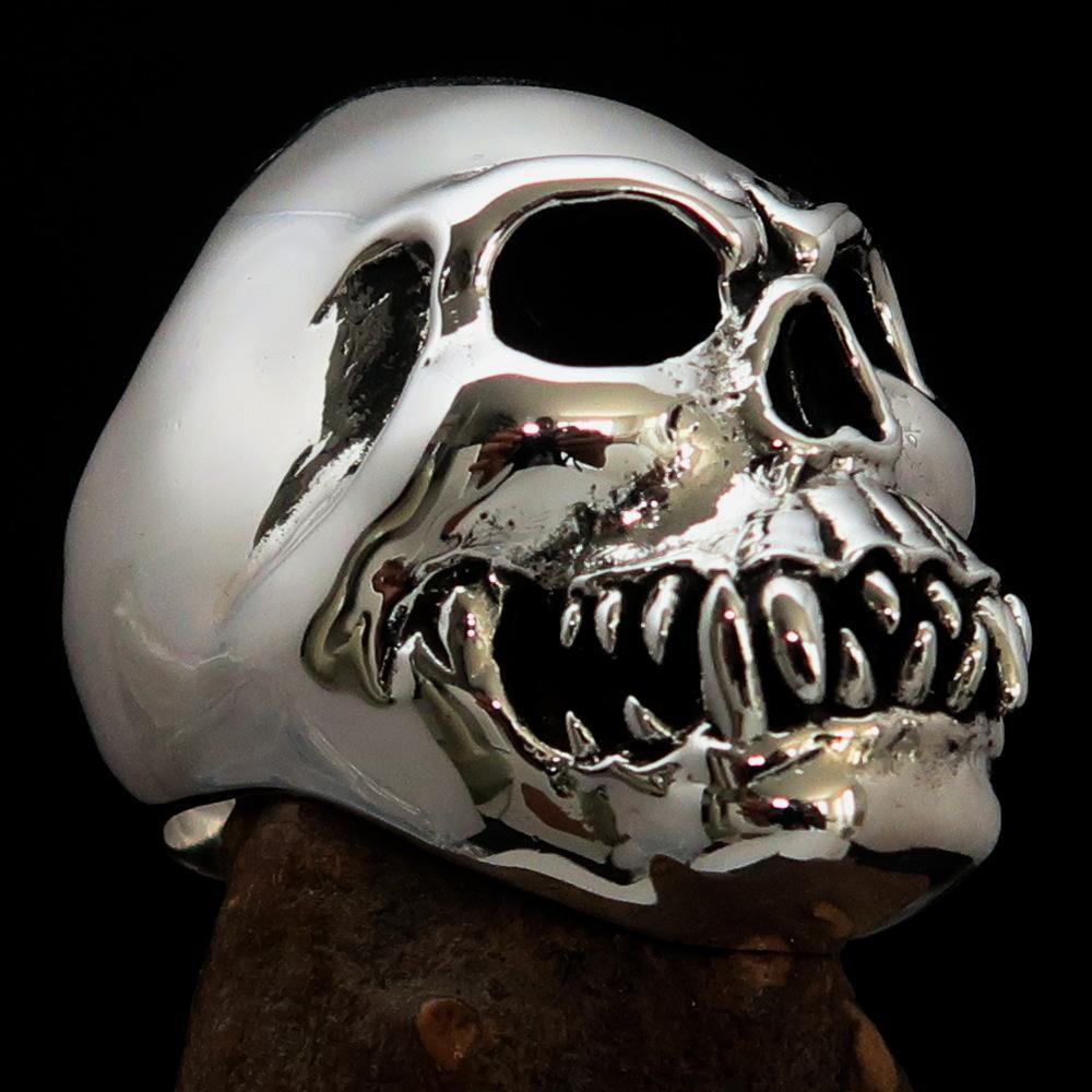 Men's Zombie Fang Skull Ring made of antiqued sterling silver, showcasing a unique skull design with fang details.