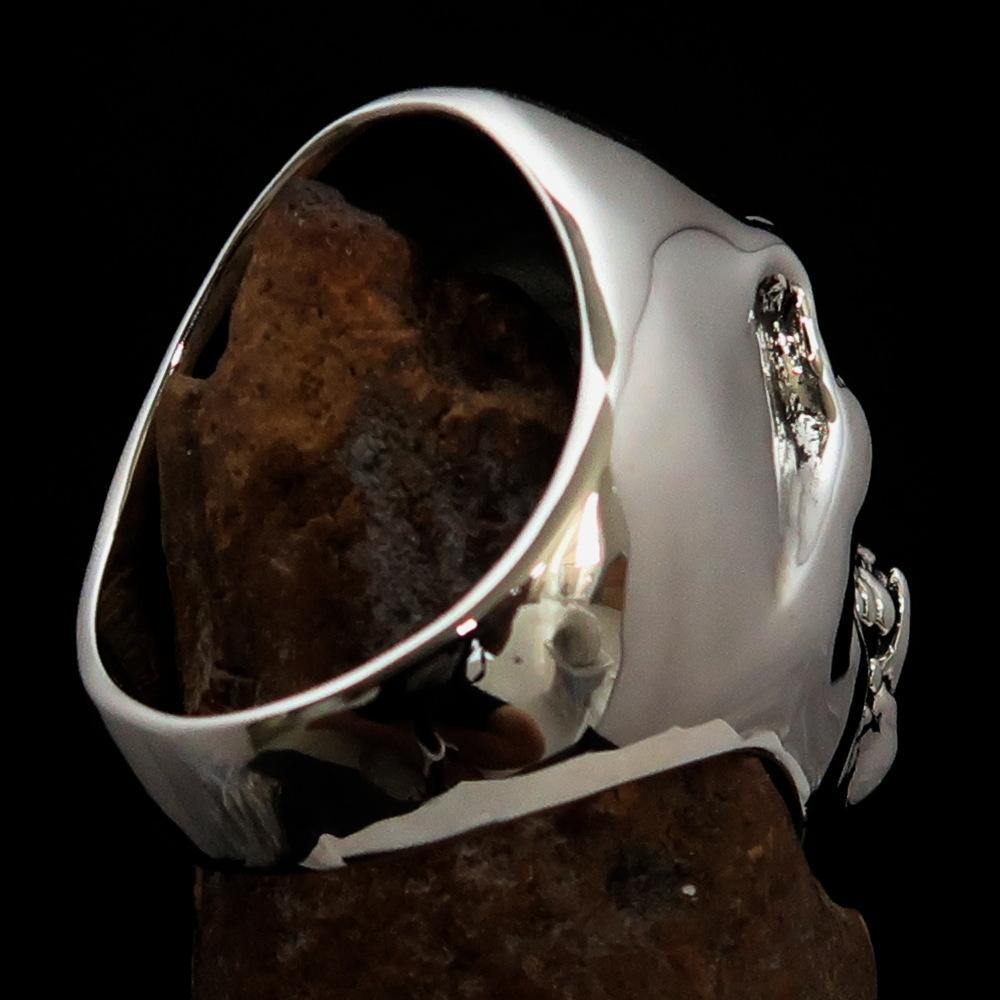 Men's Zombie Fang Skull Ring made of antiqued sterling silver, showcasing a unique skull design with fang details.