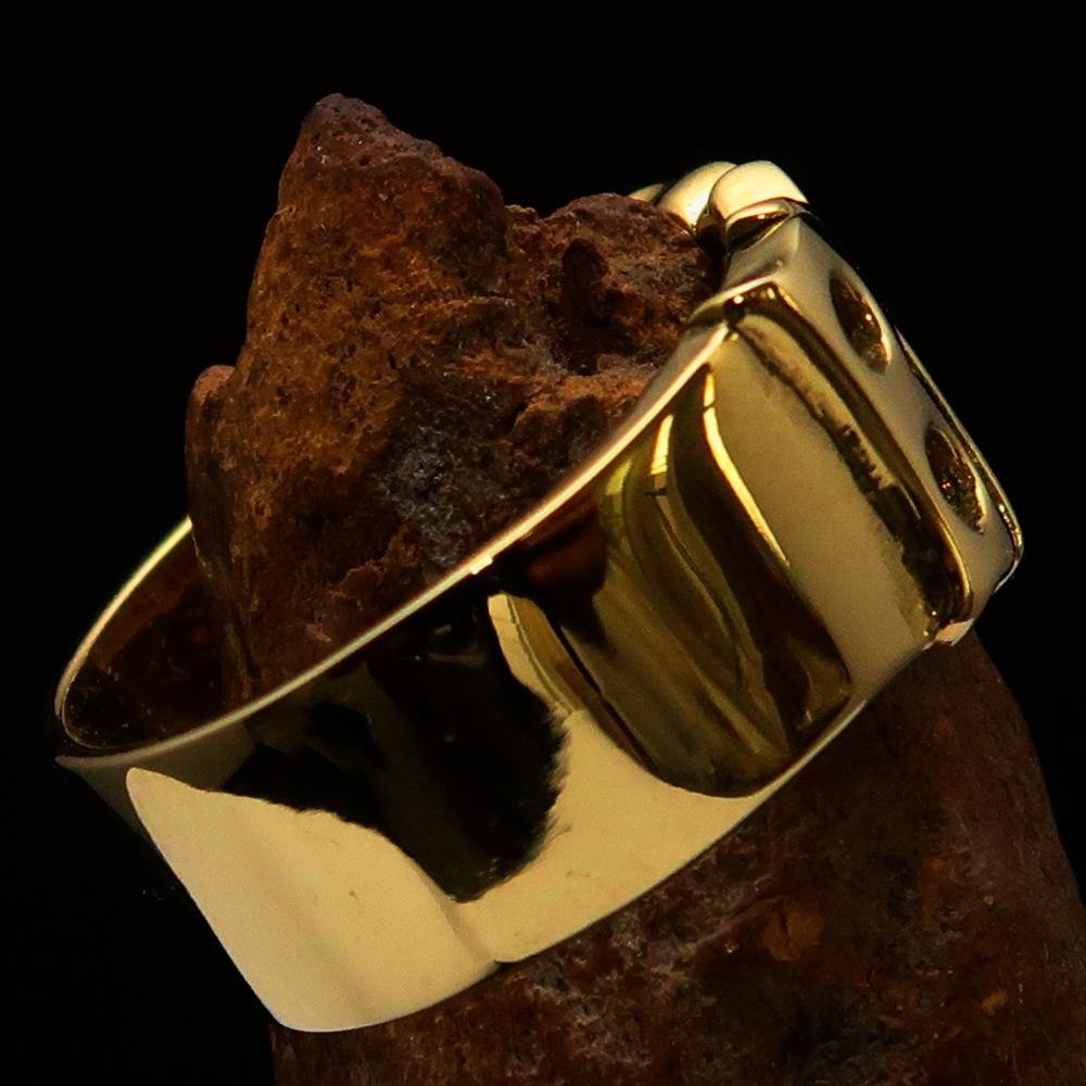 A high polished solid brass ring featuring the word 'Bitch', measuring 12 mm wide, showcasing its elegant design.