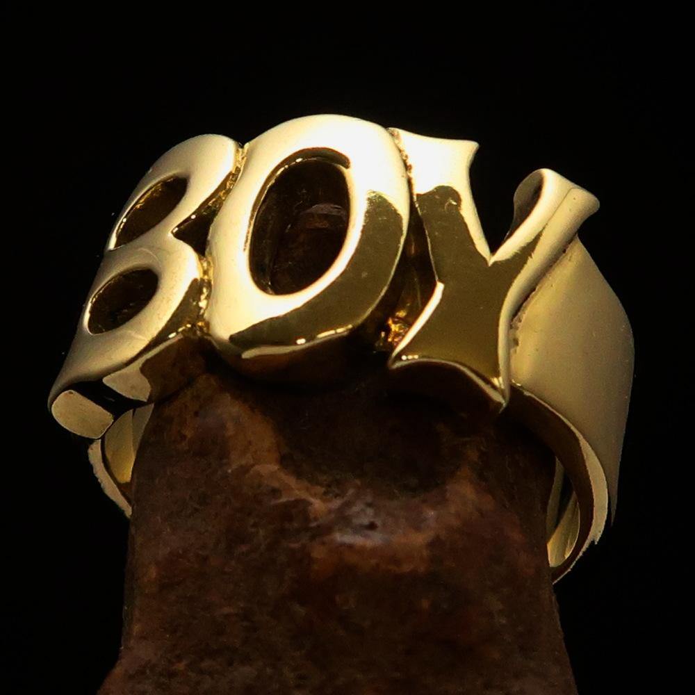 A beautifully crafted One Word Boy Ring made of solid brass, featuring a high polish finish and a width of 12 mm.