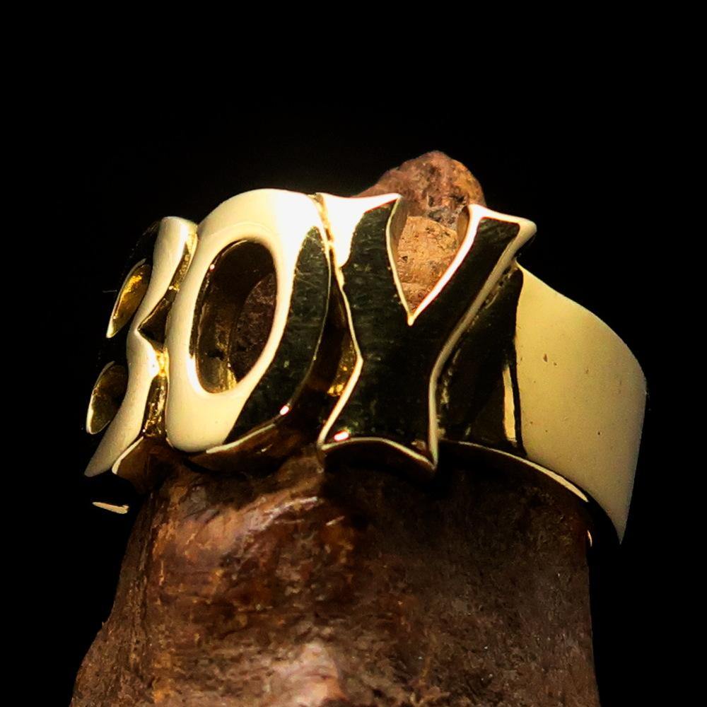 A beautifully crafted One Word Boy Ring made of solid brass, featuring a high polish finish and a width of 12 mm.