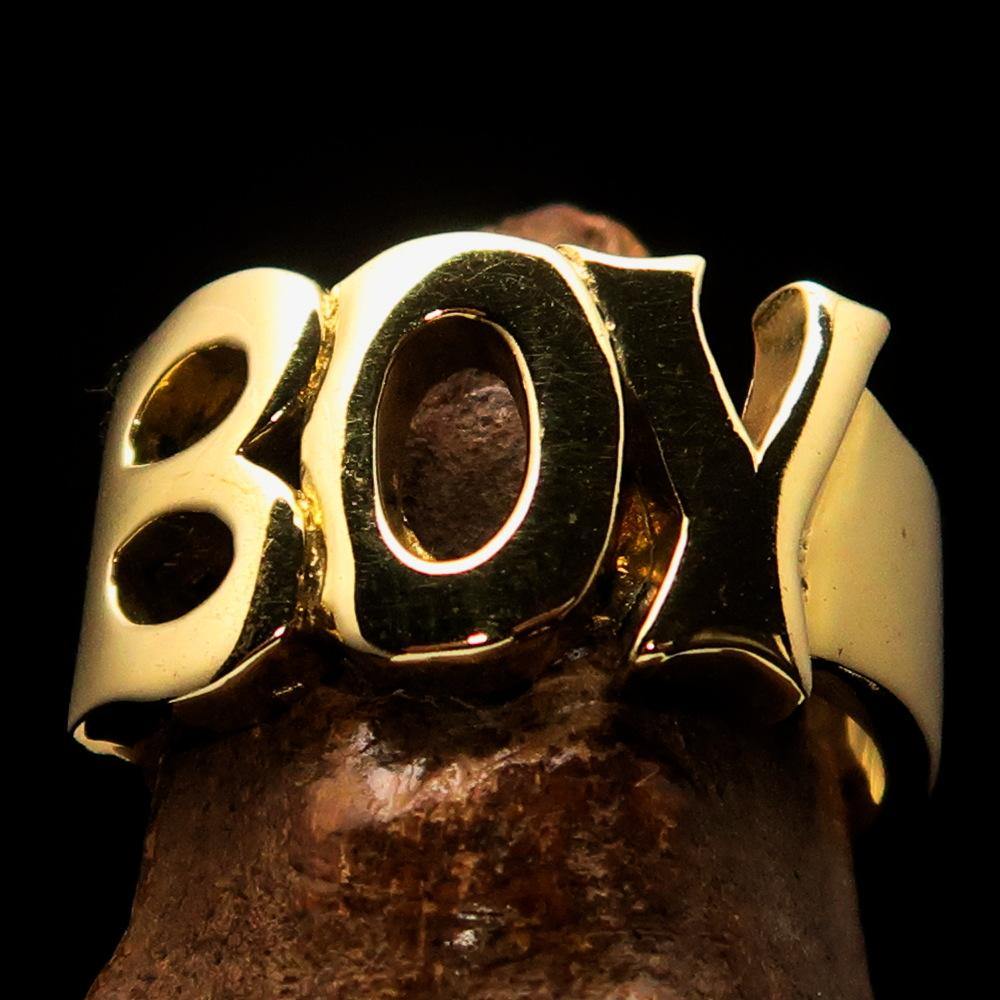 A beautifully crafted One Word Boy Ring made of solid brass, featuring a high polish finish and a width of 12 mm.