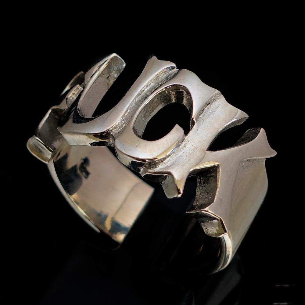 A high polished sterling silver One Word F*ck Ring, showcasing its bold design and hallmarked 925 authenticity.