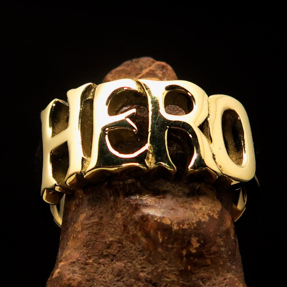 A high-polished solid brass One Word HERO Ring, showcasing its elegant design and 10 mm width.