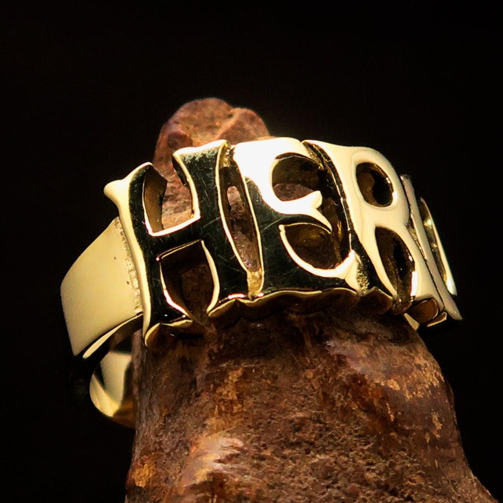 A high-polished solid brass One Word HERO Ring, showcasing its elegant design and 10 mm width.