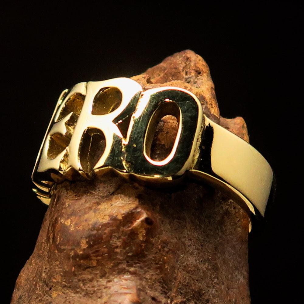 A high-polished solid brass One Word HERO Ring, showcasing its elegant design and 10 mm width.