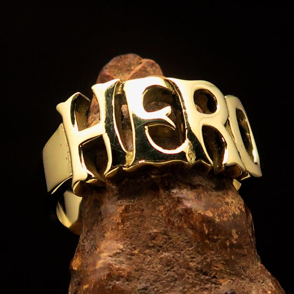 A high-polished solid brass One Word HERO Ring, showcasing its elegant design and 10 mm width.