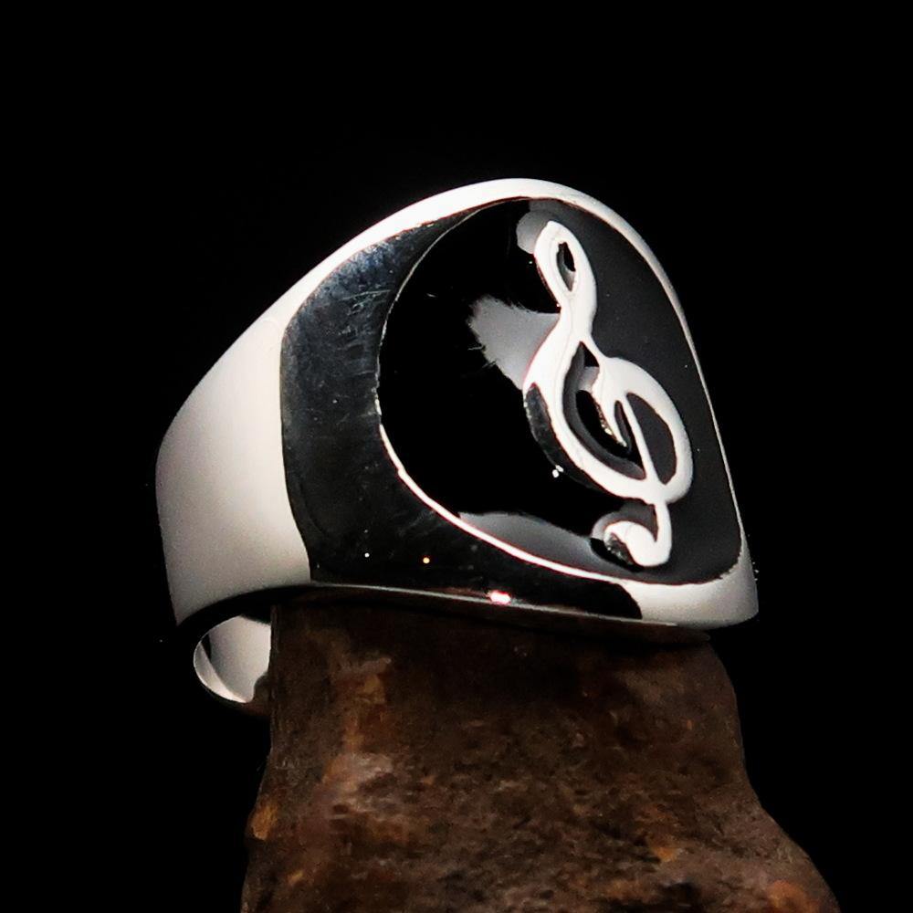 Men's black Treble Clef Ring made of high-polished sterling silver with black enamel, showcasing a musical symbol.