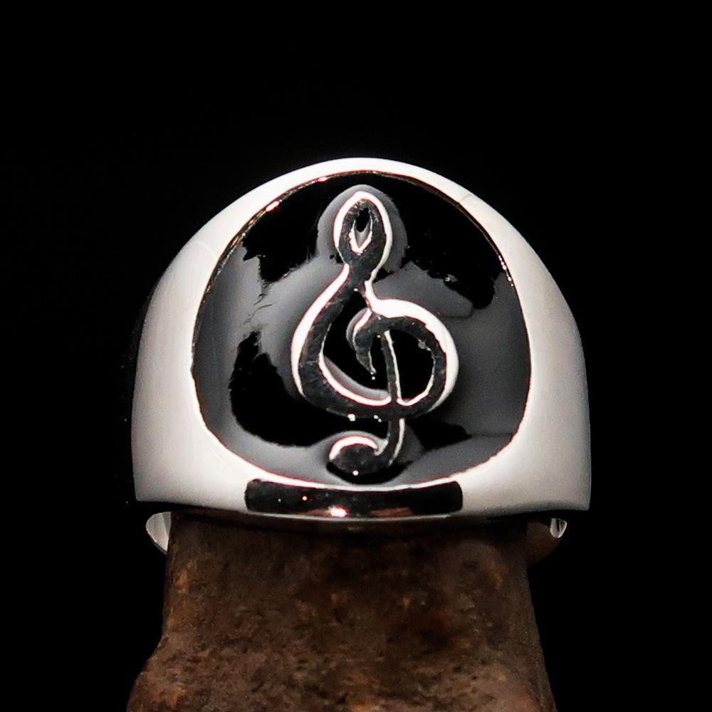 Men's black Treble Clef Ring made of high-polished sterling silver with black enamel, showcasing a musical symbol.