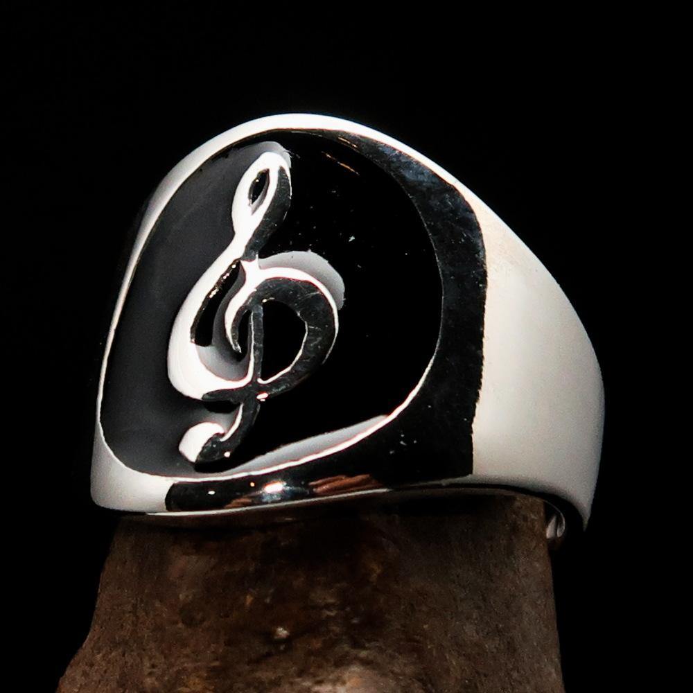 Men's black Treble Clef Ring made of high-polished sterling silver with black enamel, showcasing a musical symbol.