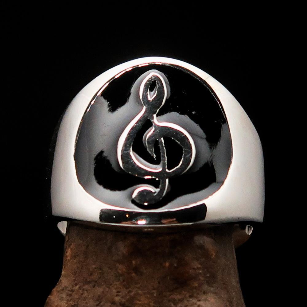 Men's black Treble Clef Ring made of high-polished sterling silver with black enamel, showcasing a musical symbol.