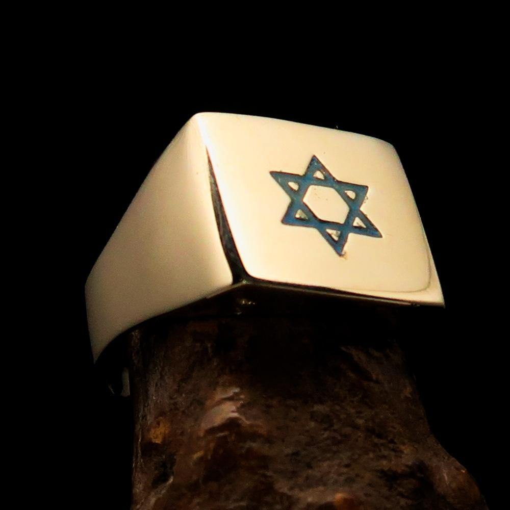 Solid brass men's ring featuring a blue Star of David with high polish and engraved RCRN logo.