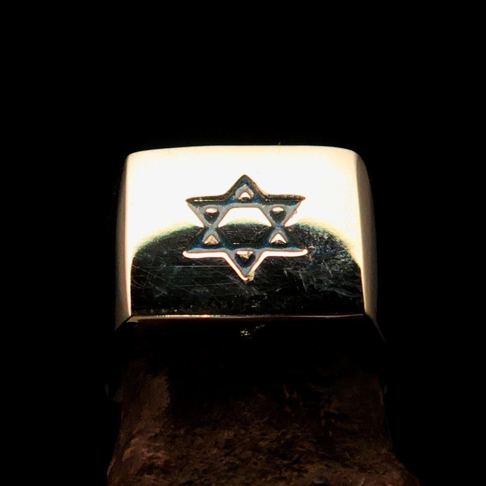 Solid brass men's ring featuring a blue Star of David with high polish and engraved RCRN logo.