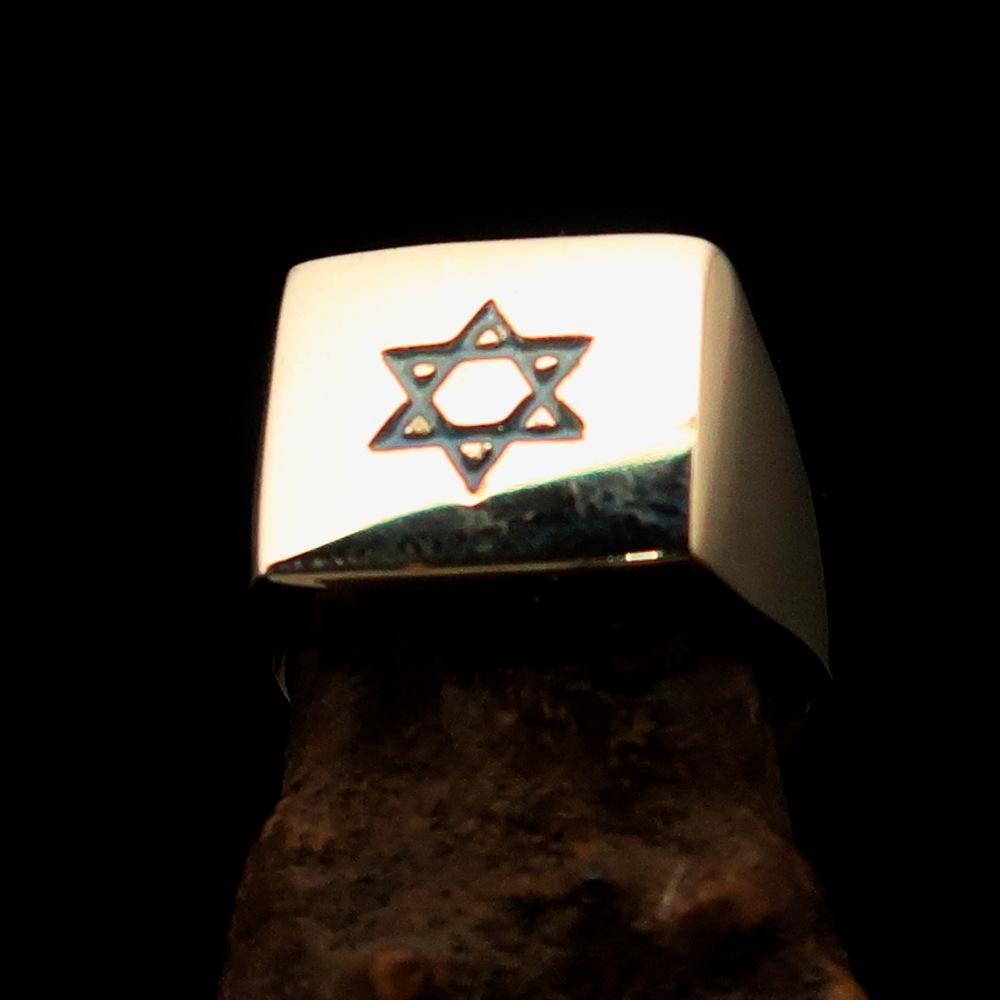 Solid brass men's ring featuring a blue Star of David with high polish and engraved RCRN logo.