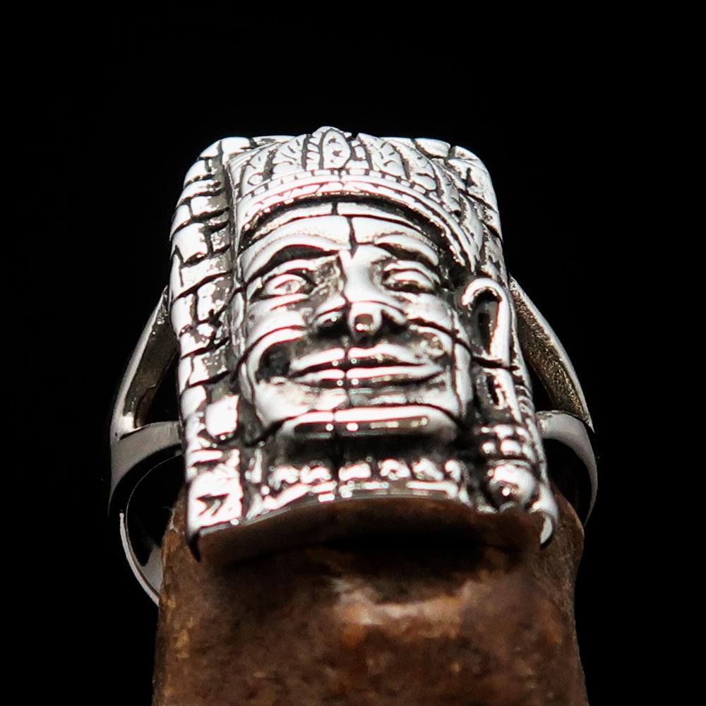 A beautifully crafted Sterling Silver Buddha Men's Ring featuring intricate details and a high polished antiqued finish, hallmarked 925.