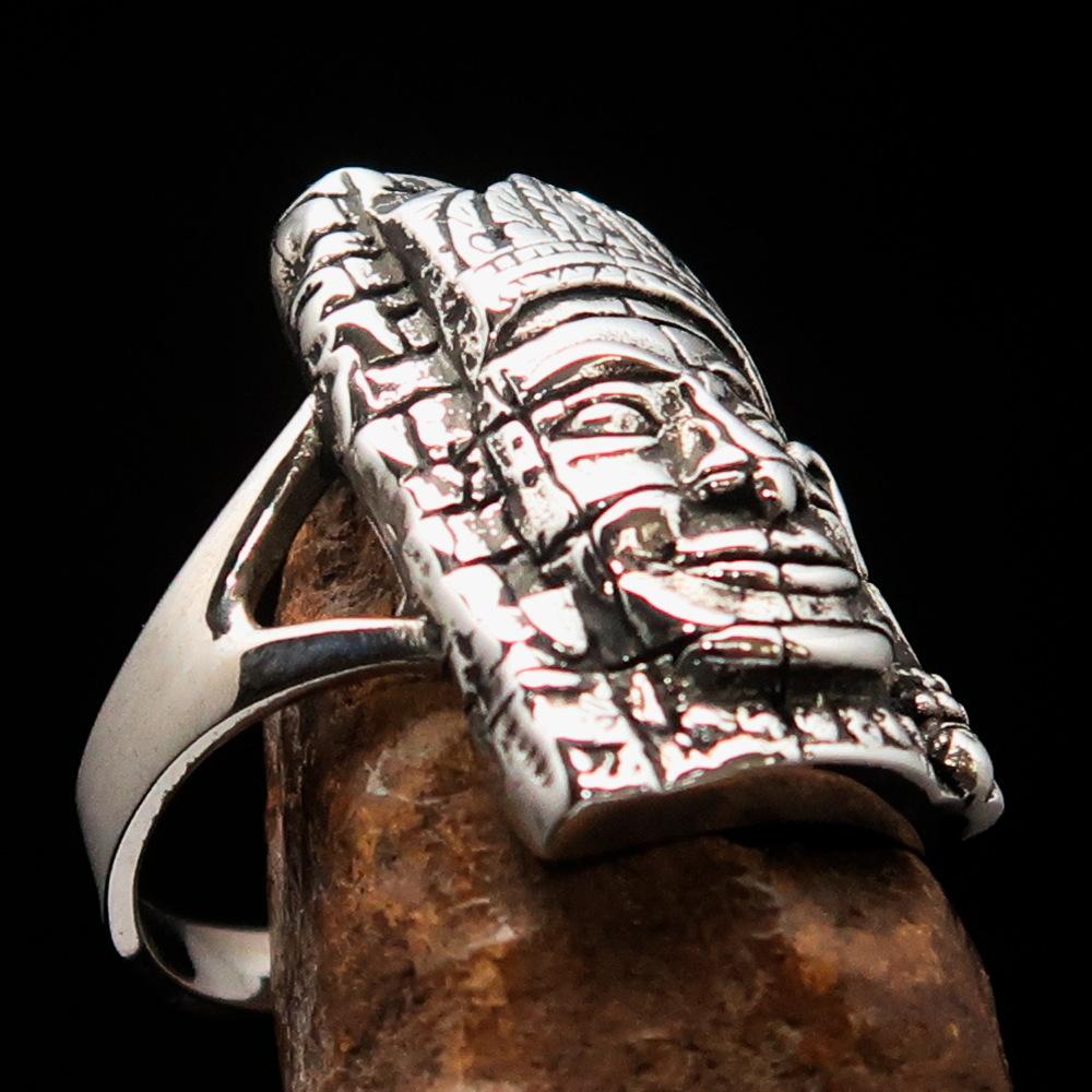 A beautifully crafted Sterling Silver Buddha Men's Ring featuring intricate details and a high polished antiqued finish, hallmarked 925.