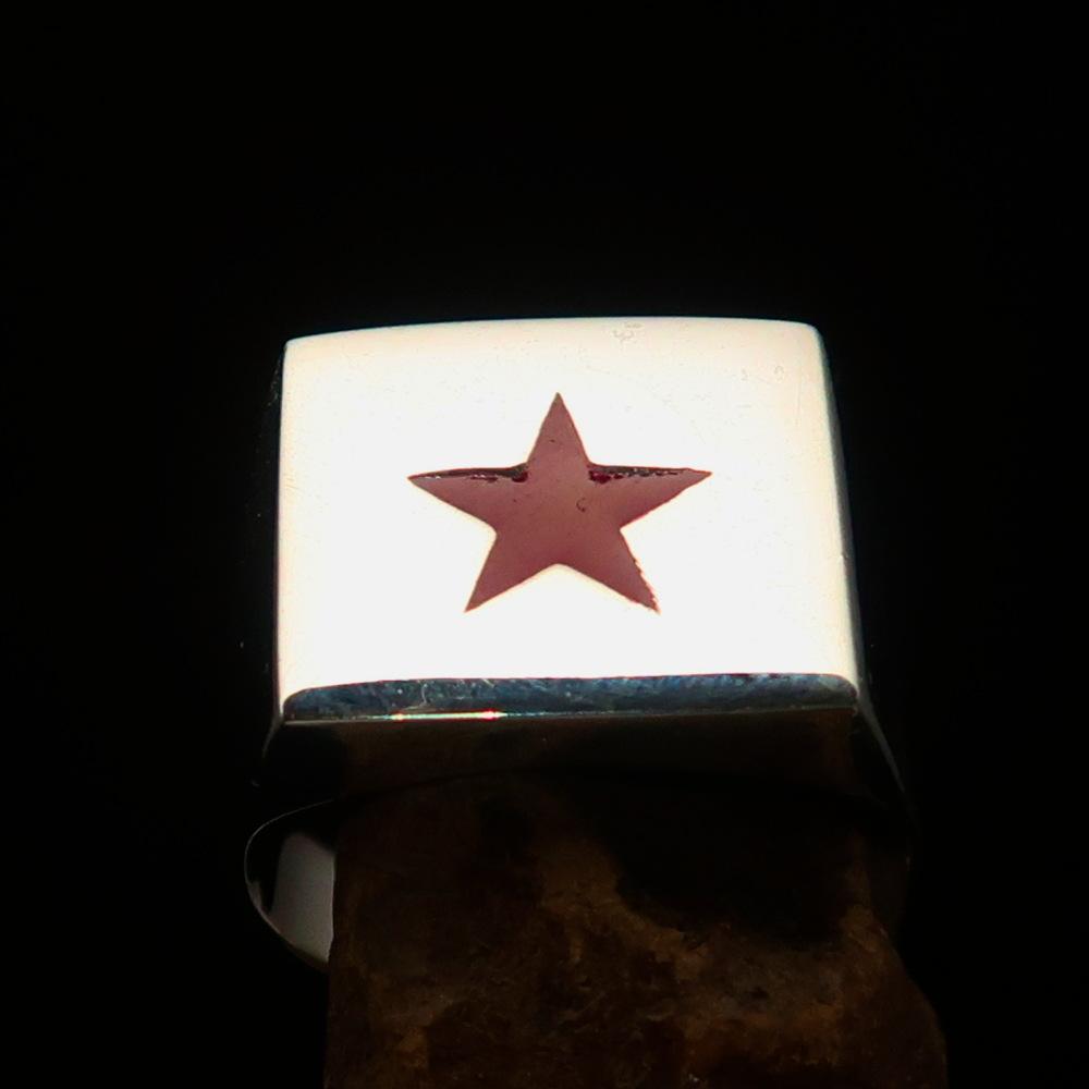 A beautifully crafted sterling silver men's ring featuring a red enamel star, hallmarked 925 with the RCRN logo engraved.