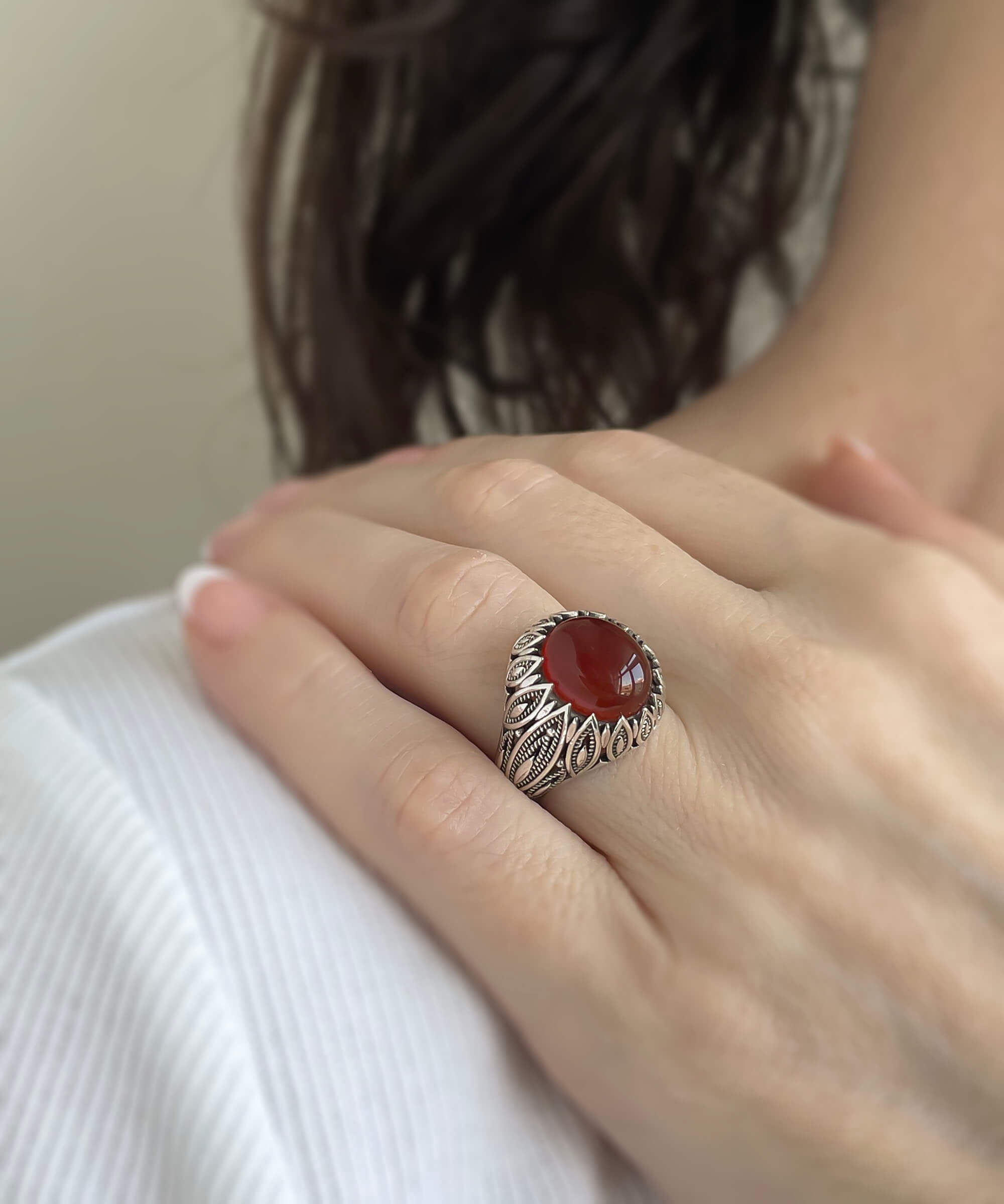 Elegant Filigree Art Carnelian Gemstone Women Silver Statement Ring showcasing intricate metalwork and a vibrant oval-cut Carnelian gemstone.